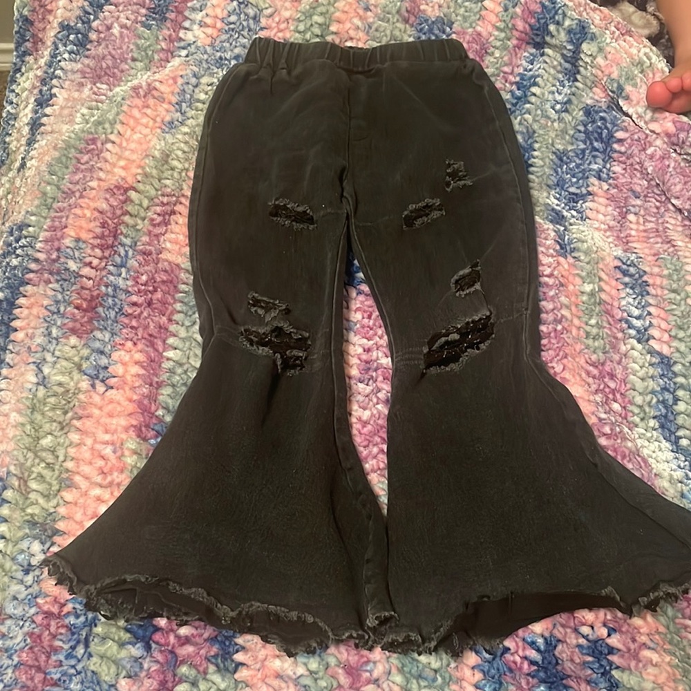 Bell bottom jeans from a company called Bella Breeze